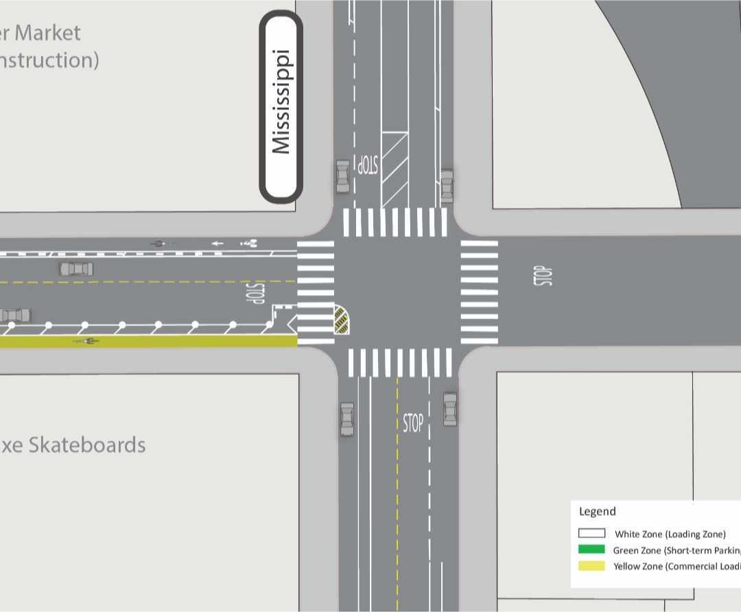 Screenshot of the 17th and Mississippi intersection schematic from the linked SFMTA project page. It shows a new, proposed parking-protected bike lane on the eastbound approach of 17th St, with turn protection in the intersection at the end of that bike lane. The westbound exiting side of 17th appears to have parking removed, so the bike lane is protected by paint and plastic. Mississippi St has no changes, and the eastern side of 17th has no changes and no bike lanes.