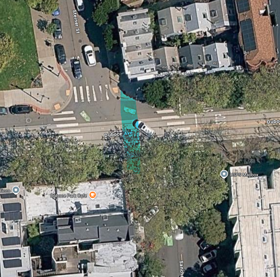 An overhead view of the intersection in question, with the unmarked crosswalk highlighted in cyan. The right sidewalk along Steiner St is in line with the left sidewalk of Sanchez St.